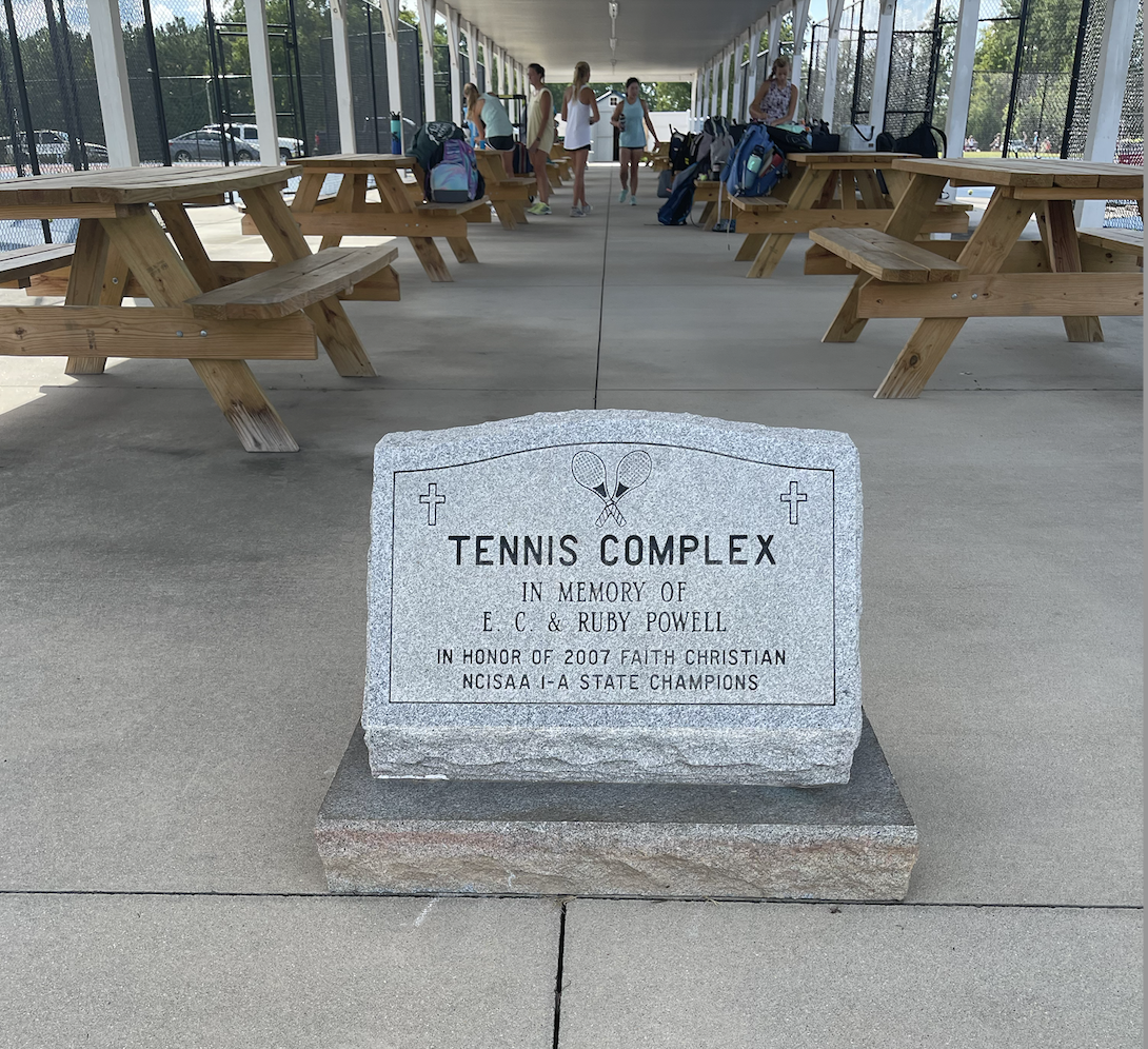 The "grave stone" Dan found at the tennis complex he was visiting